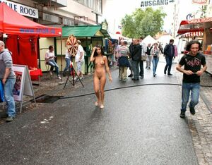 Cute teen Nika in public nudity photos in center of city